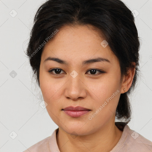 Joyful latino young-adult female with medium  brown hair and brown eyes