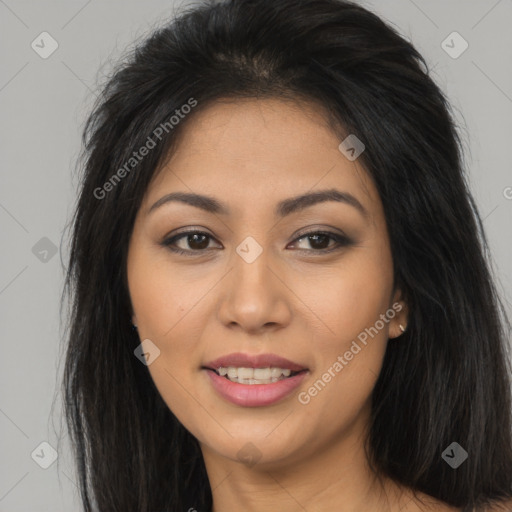 Joyful asian young-adult female with long  brown hair and brown eyes