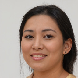 Joyful white young-adult female with medium  brown hair and brown eyes