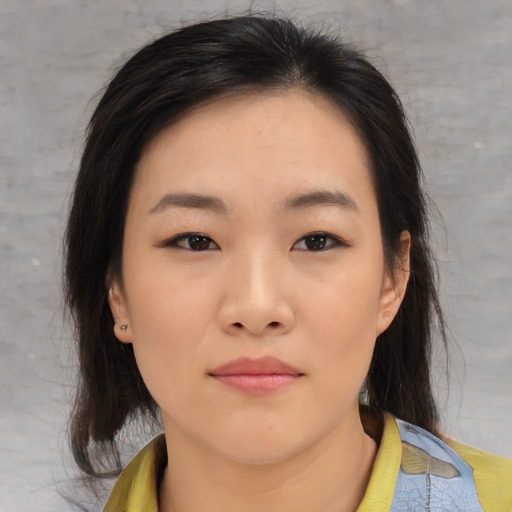 Neutral asian young-adult female with medium  brown hair and brown eyes