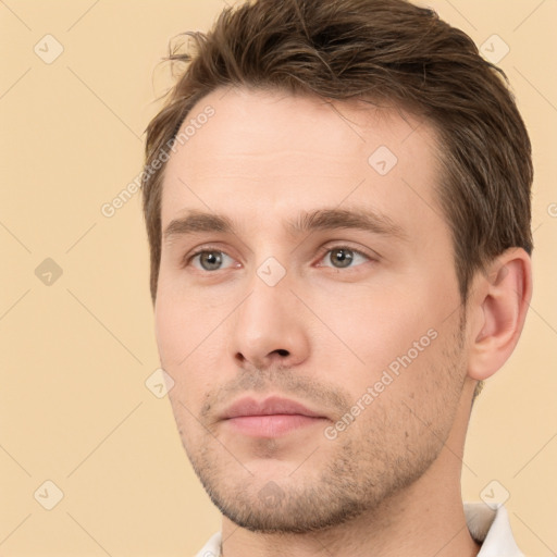 Neutral white young-adult male with short  brown hair and brown eyes