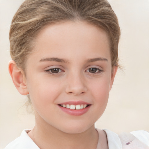 Joyful white child female with medium  brown hair and brown eyes