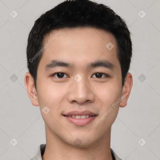 Joyful white young-adult male with short  black hair and brown eyes