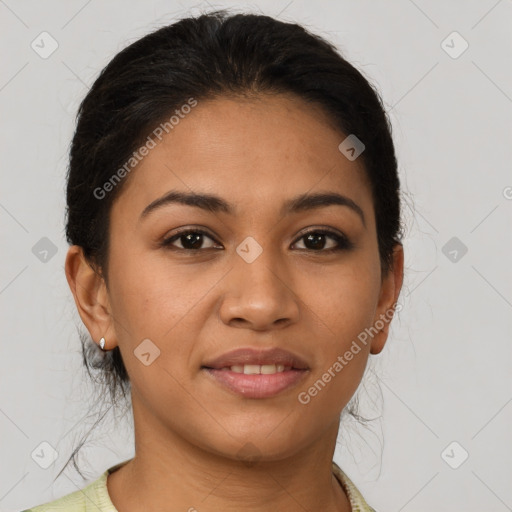 Joyful latino young-adult female with short  brown hair and brown eyes