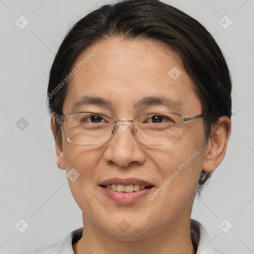 Joyful white adult female with short  brown hair and brown eyes