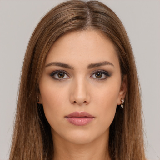 Neutral white young-adult female with long  brown hair and brown eyes