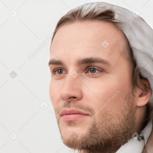 Neutral white young-adult male with short  brown hair and grey eyes