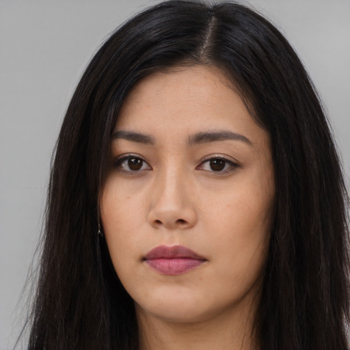Neutral asian young-adult female with long  brown hair and brown eyes