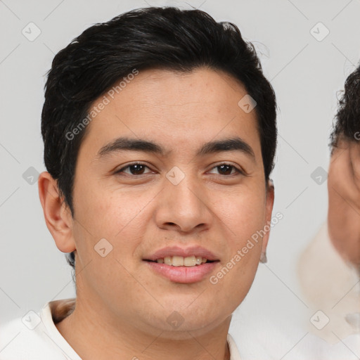 Joyful latino young-adult male with short  brown hair and brown eyes