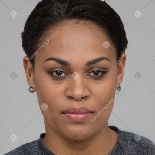 Joyful black young-adult female with short  black hair and brown eyes