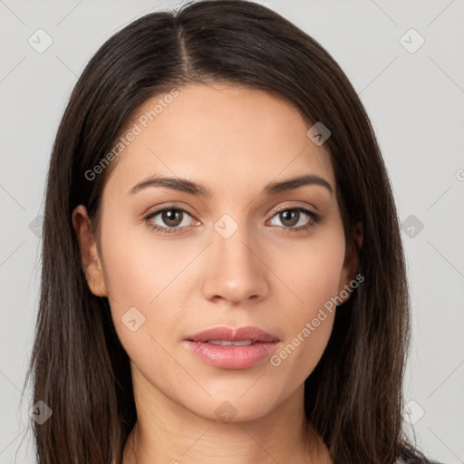 Neutral white young-adult female with long  brown hair and brown eyes