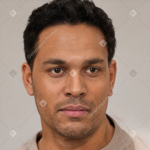 Neutral latino young-adult male with short  brown hair and brown eyes