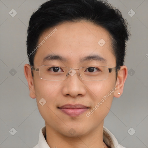 Joyful asian young-adult male with short  brown hair and brown eyes