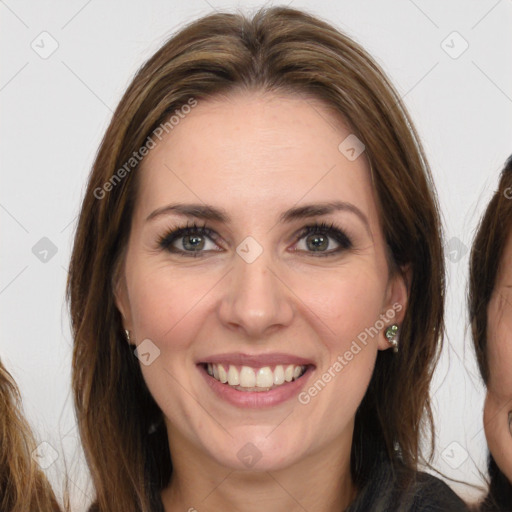 Joyful white adult female with long  brown hair and brown eyes