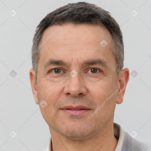 Joyful white adult male with short  brown hair and brown eyes