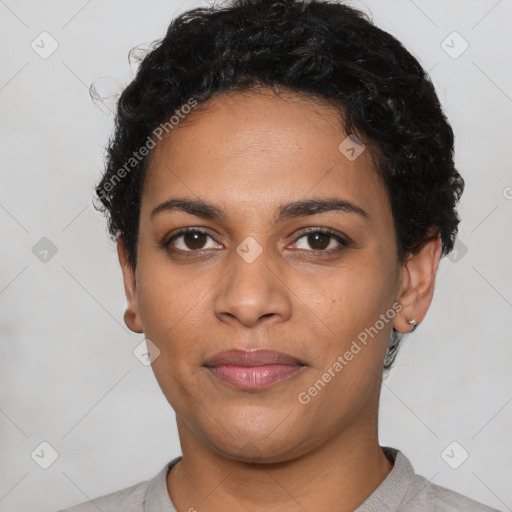 Joyful latino young-adult female with short  black hair and brown eyes