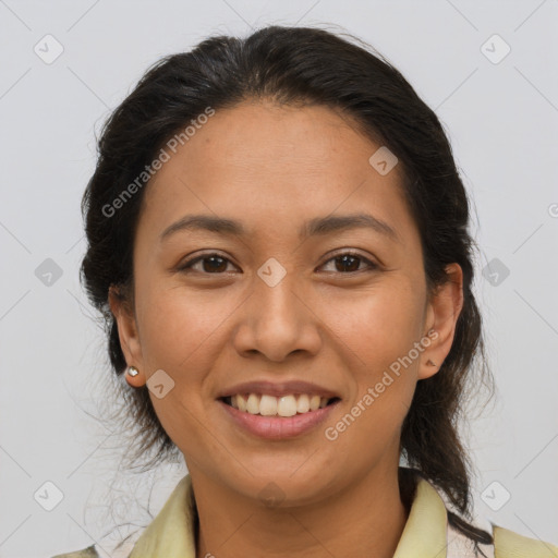 Joyful latino young-adult female with medium  brown hair and brown eyes