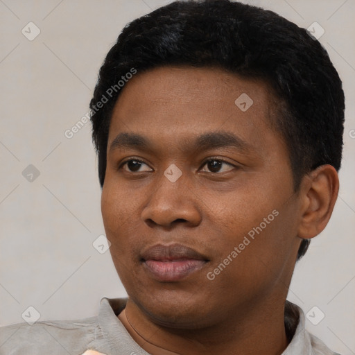 Neutral black young-adult male with short  black hair and brown eyes