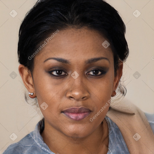 Joyful black young-adult female with medium  black hair and brown eyes