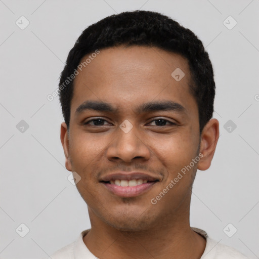 Joyful latino young-adult male with short  black hair and brown eyes