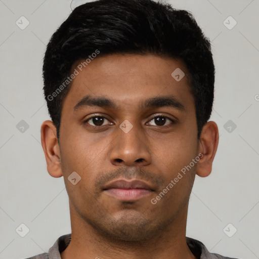 Neutral latino young-adult male with short  black hair and brown eyes