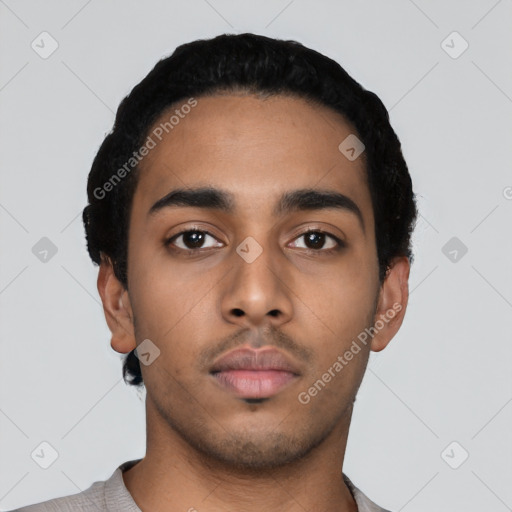 Neutral latino young-adult male with short  black hair and brown eyes
