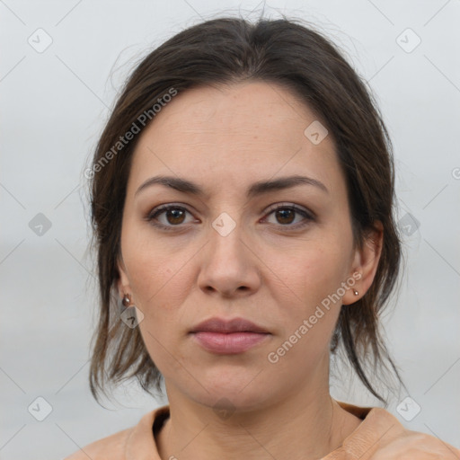 Neutral white young-adult female with medium  brown hair and brown eyes