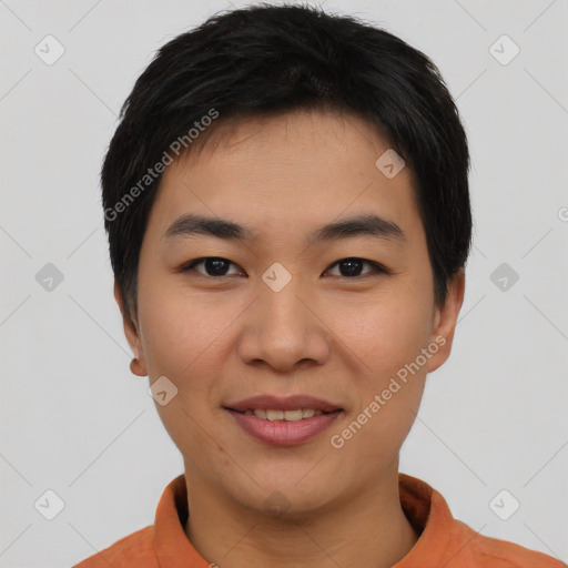 Joyful asian young-adult male with short  black hair and brown eyes