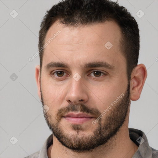 Neutral white young-adult male with short  brown hair and brown eyes