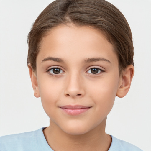 Joyful white child female with short  brown hair and brown eyes