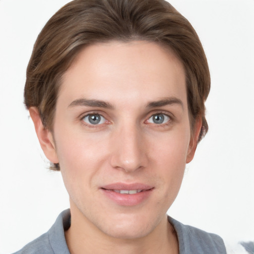 Joyful white young-adult female with short  brown hair and grey eyes