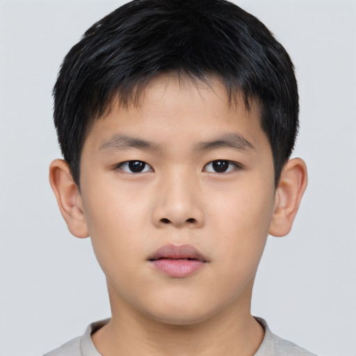 Neutral asian child male with short  brown hair and brown eyes
