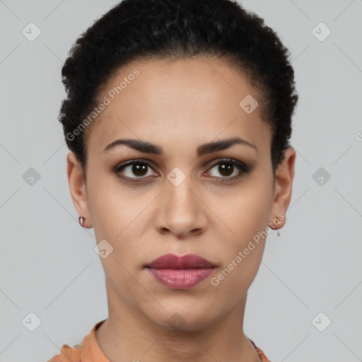 Joyful latino young-adult female with short  black hair and brown eyes