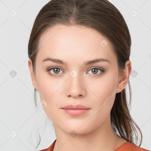 Neutral white young-adult female with medium  brown hair and brown eyes