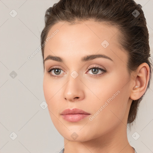 Neutral white young-adult female with medium  brown hair and brown eyes