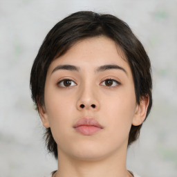 Neutral asian young-adult female with medium  brown hair and brown eyes