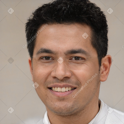 Joyful white young-adult male with short  black hair and brown eyes