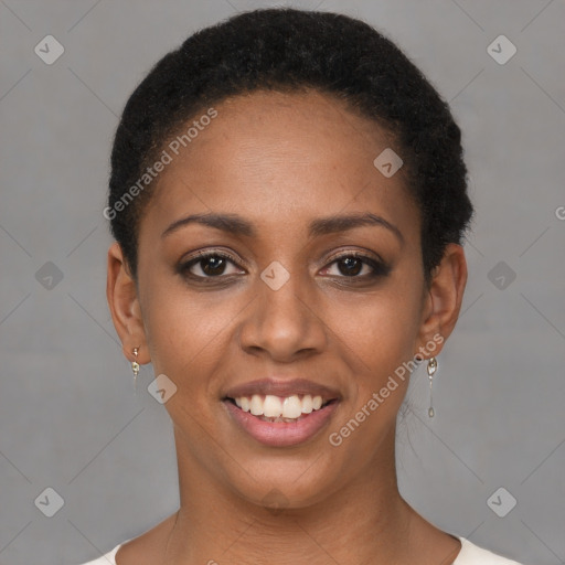 Joyful black young-adult female with short  brown hair and brown eyes