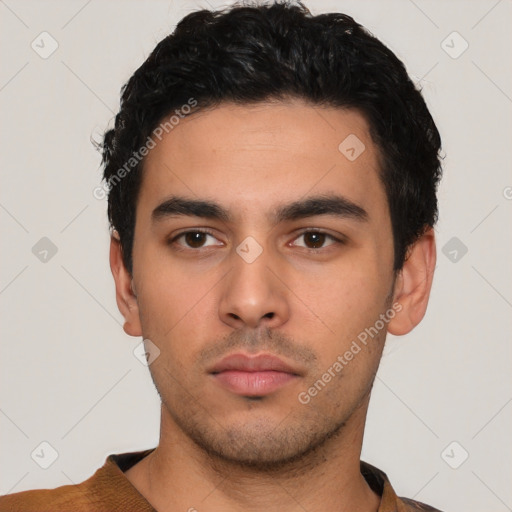 Neutral latino young-adult male with short  black hair and brown eyes