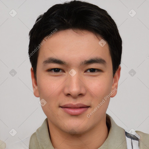 Joyful asian young-adult male with short  black hair and brown eyes