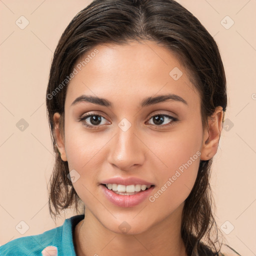 Joyful white young-adult female with medium  brown hair and brown eyes