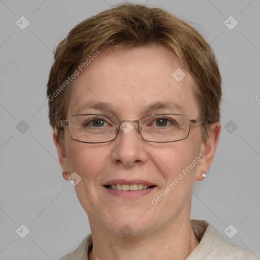 Joyful white adult female with short  brown hair and grey eyes