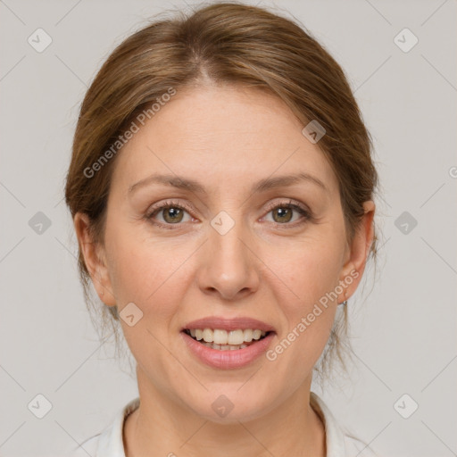 Joyful white adult female with medium  brown hair and grey eyes