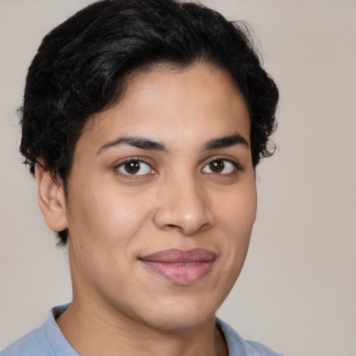 Joyful latino young-adult female with short  brown hair and brown eyes