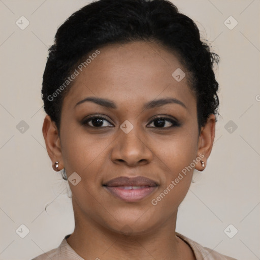 Joyful black young-adult female with short  brown hair and brown eyes