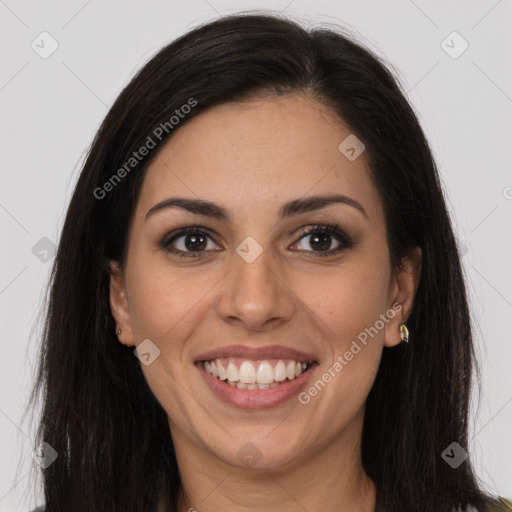 Joyful latino young-adult female with long  brown hair and brown eyes