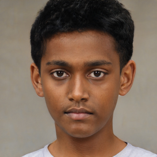 Neutral black child male with short  black hair and brown eyes