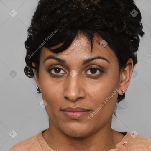 Joyful latino young-adult female with short  black hair and brown eyes