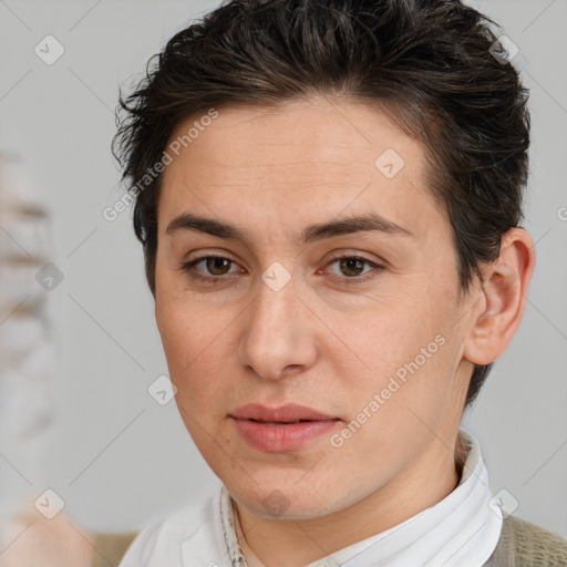 Joyful white young-adult female with short  brown hair and brown eyes