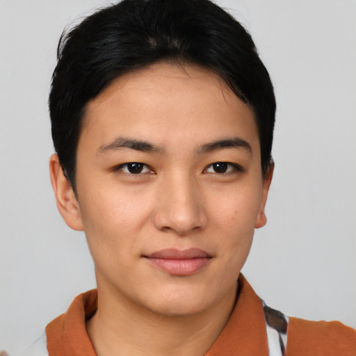Joyful asian young-adult female with short  brown hair and brown eyes
